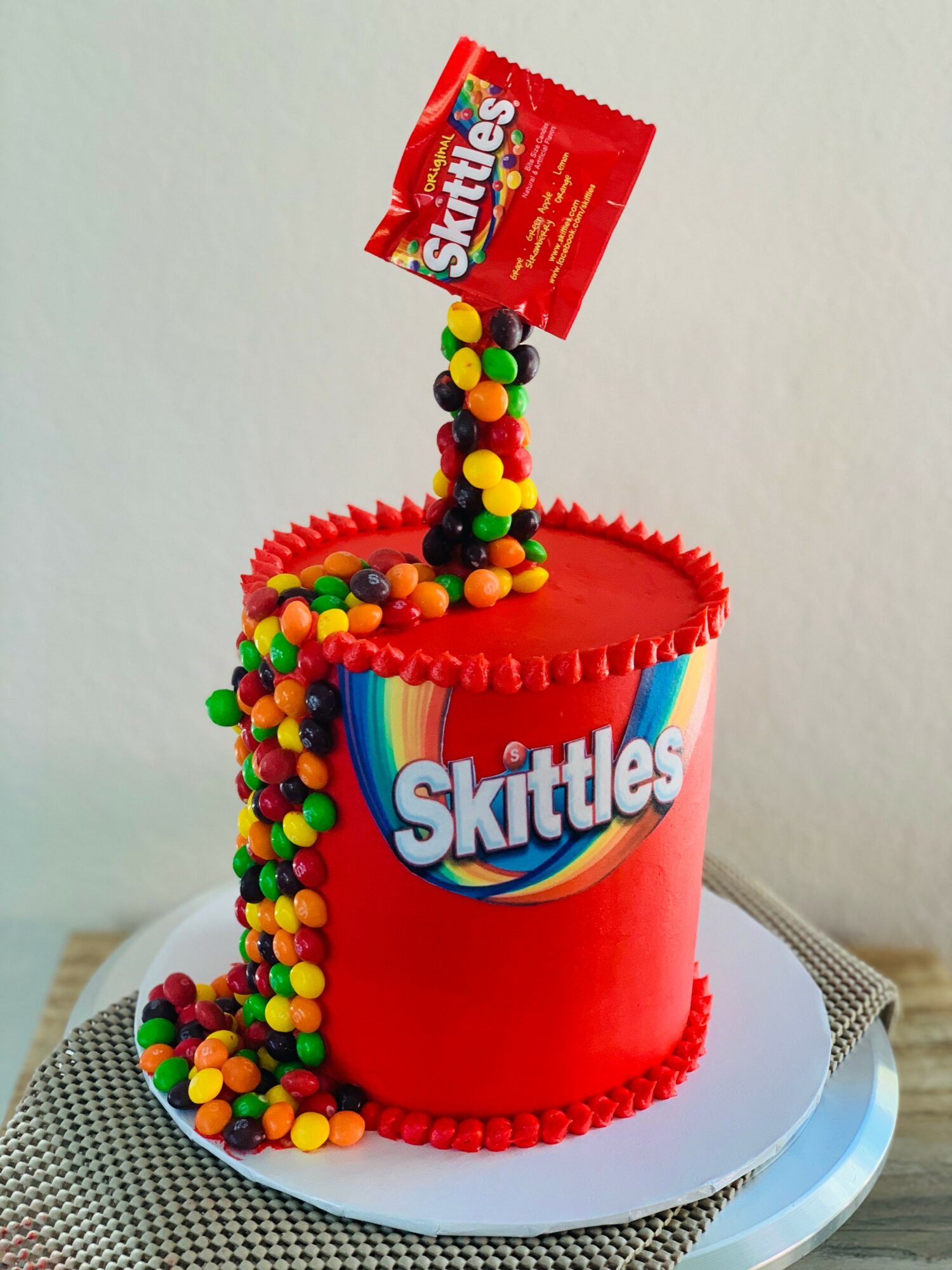 Skittles gravity cake - Decorated Cake by Maria - CakesDecor