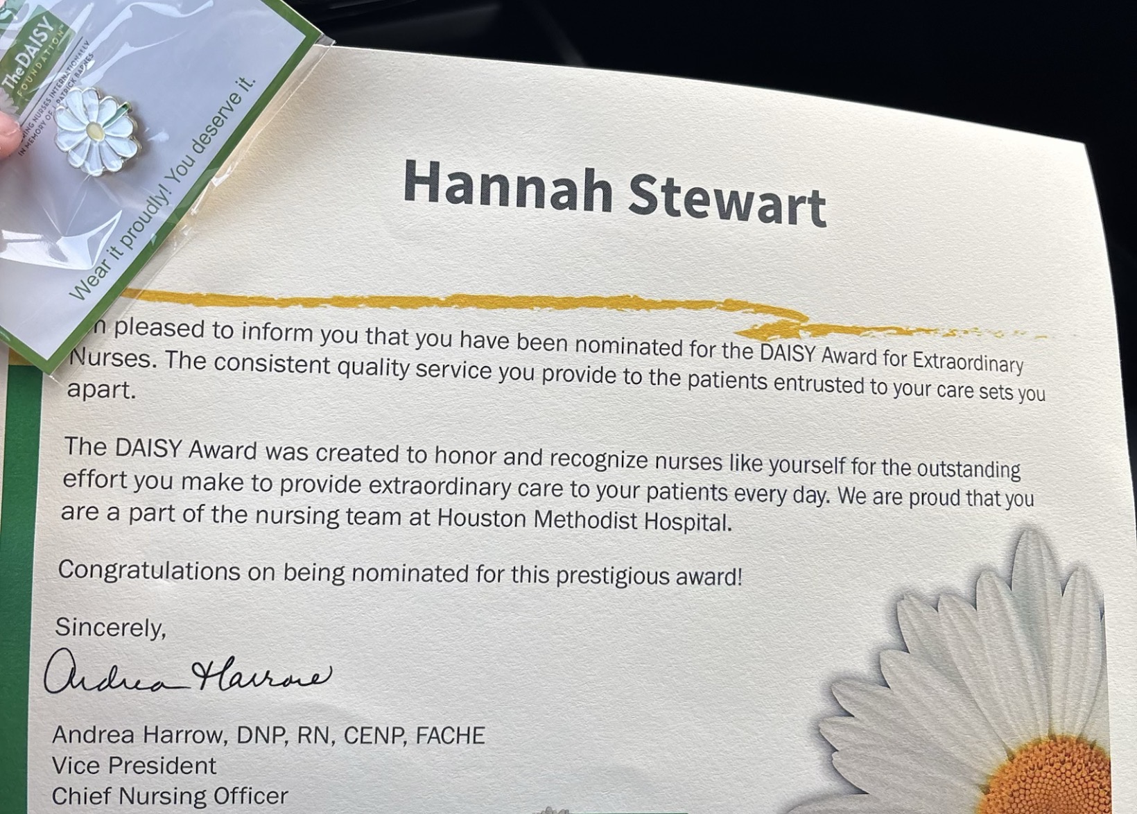 Certificate with Hannah Stewart's name, congratulating her for a DAISY Award, with a flower design in the corner.