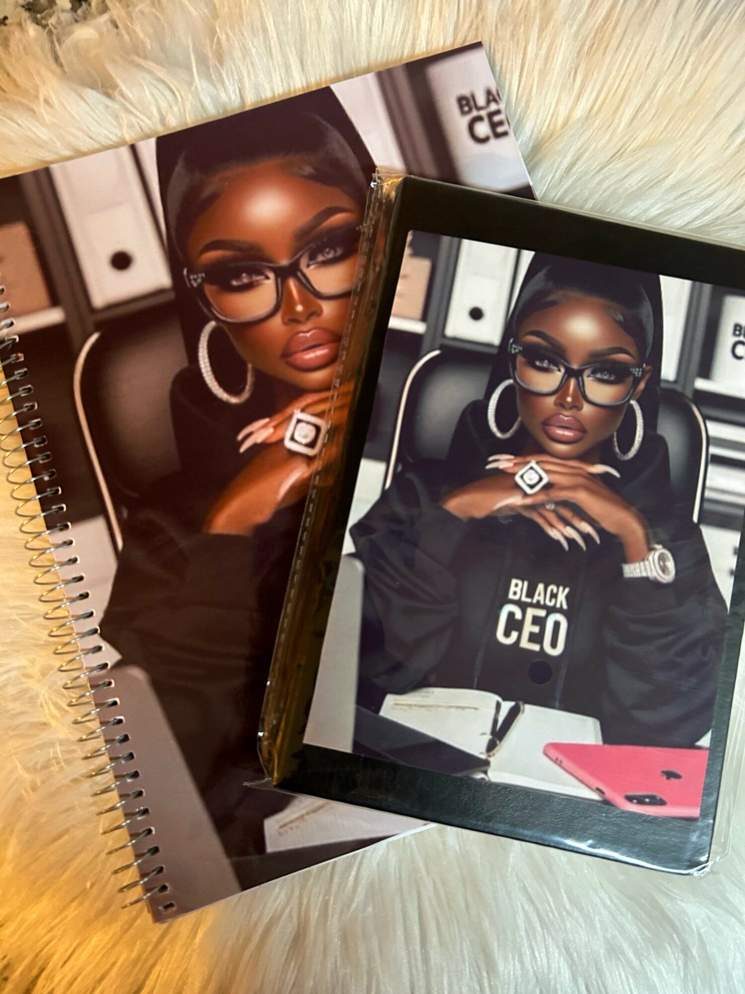 Photograph of a woman wearing glasses and large hoop earrings, sitting in a car with a sign reading 'BLACK CEO'.
