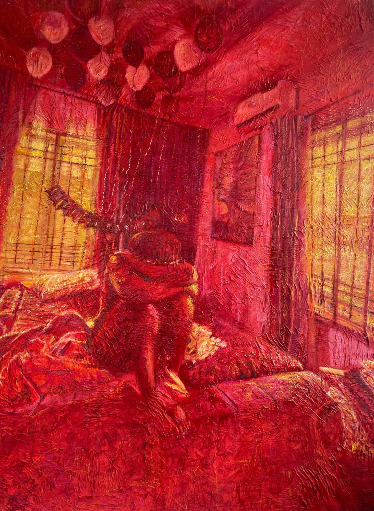 Child sitting on bed in a room with yellow curtains, wooden walls, and a framed picture, illuminated by warm light.