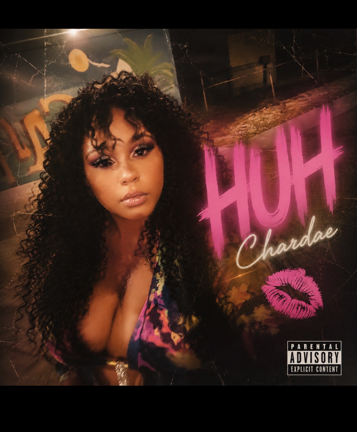 Portrait of a woman with curly hair, makeup, and a colorful top, with neon pink text and a lipstick kiss graphic in the background.