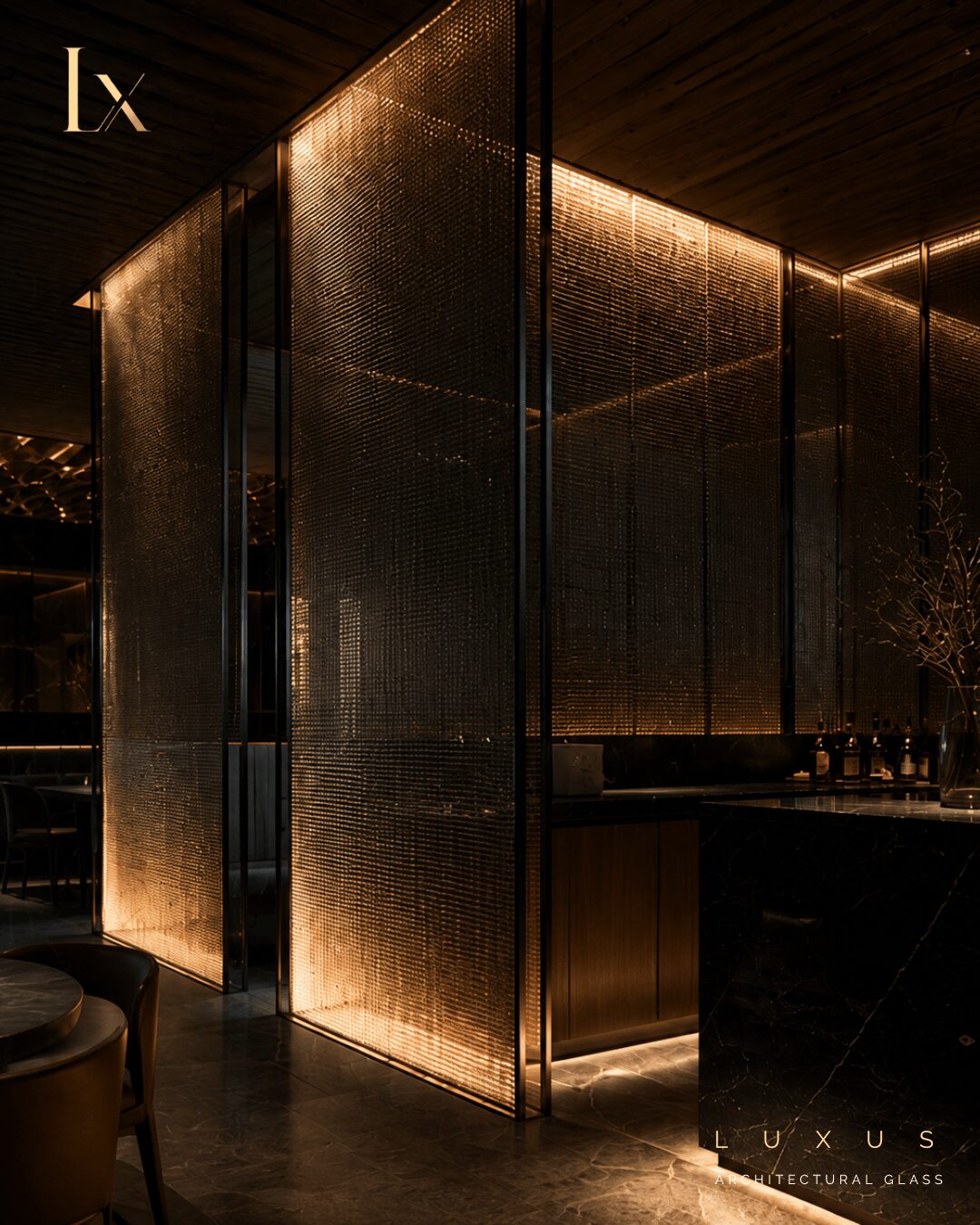 Interior with illuminated textured gold panels and dark furniture, modern design, warm lighting, luxurious ambiance.