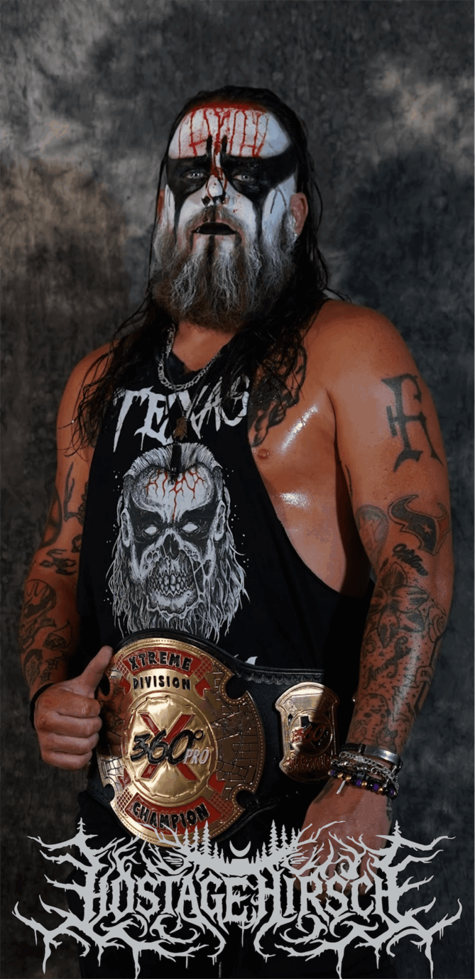 Person with face paint, long hair, tattoos, wearing a sleeveless shirt, holding a championship belt, dark background.