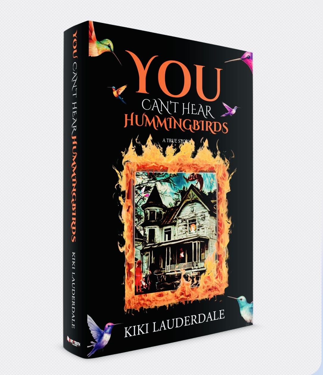 Book cover titled 'You Can't Hear Hummingbirds' by Kiki Lauderdale features a haunted house with flames around it, black background.