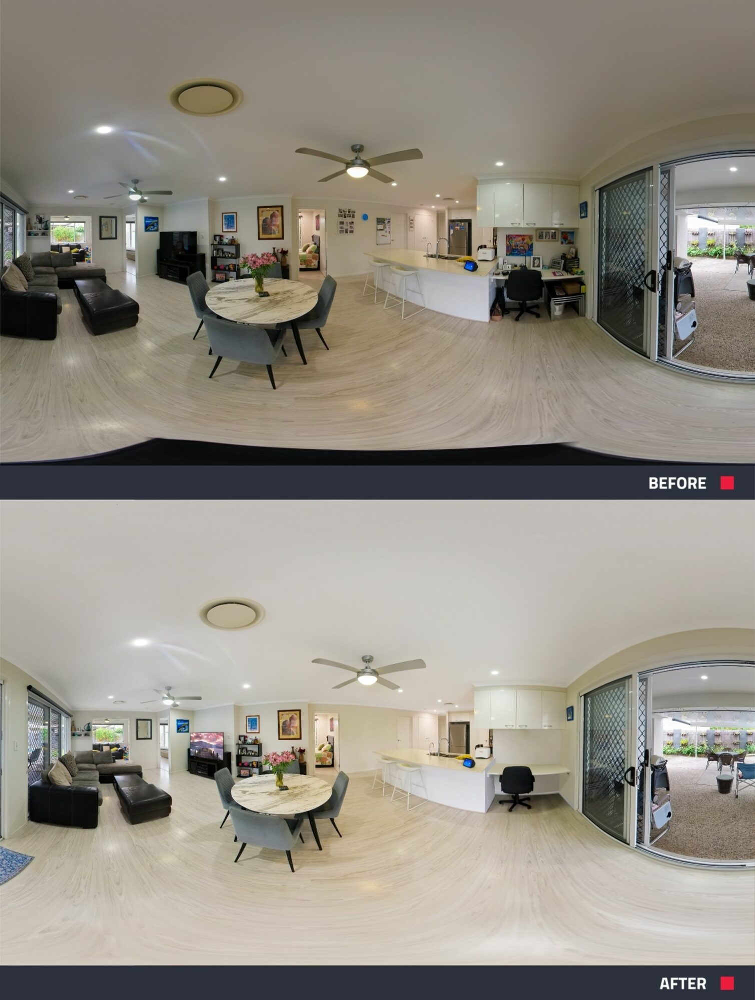 Living room with dining table, chairs, sofa, and kitchen area, viewed from entrance, with a large window and ceiling fan.