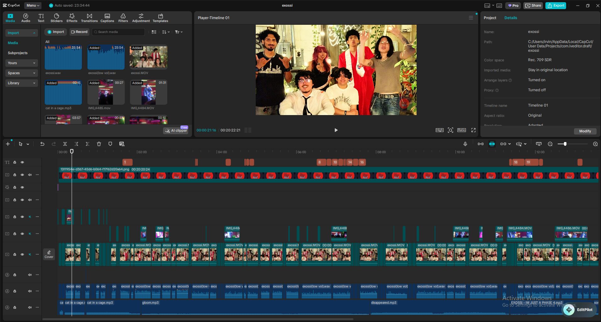 Screenshot of video editing software with timeline, clips, and preview window showing a group of people. Word processing tools visible.