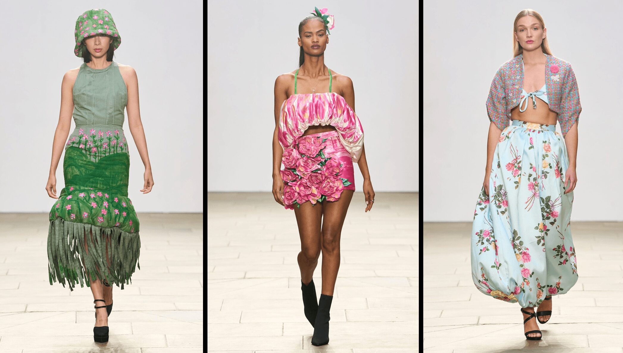Three models walk runway in colorful, patterned outfits with different styles and accessories.