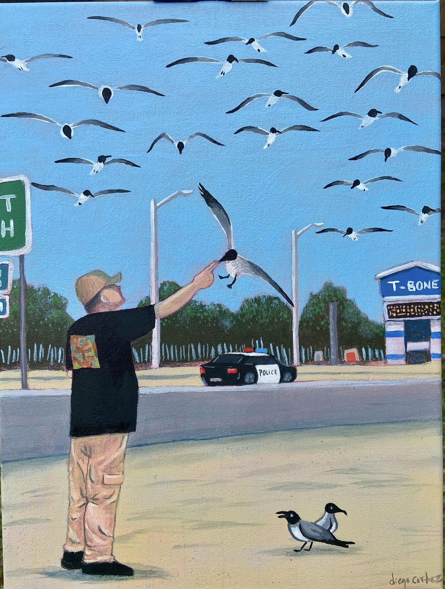 Person feeding seagulls on a street with a car and a T-Bone restaurant in background, sky filled with flying birds.