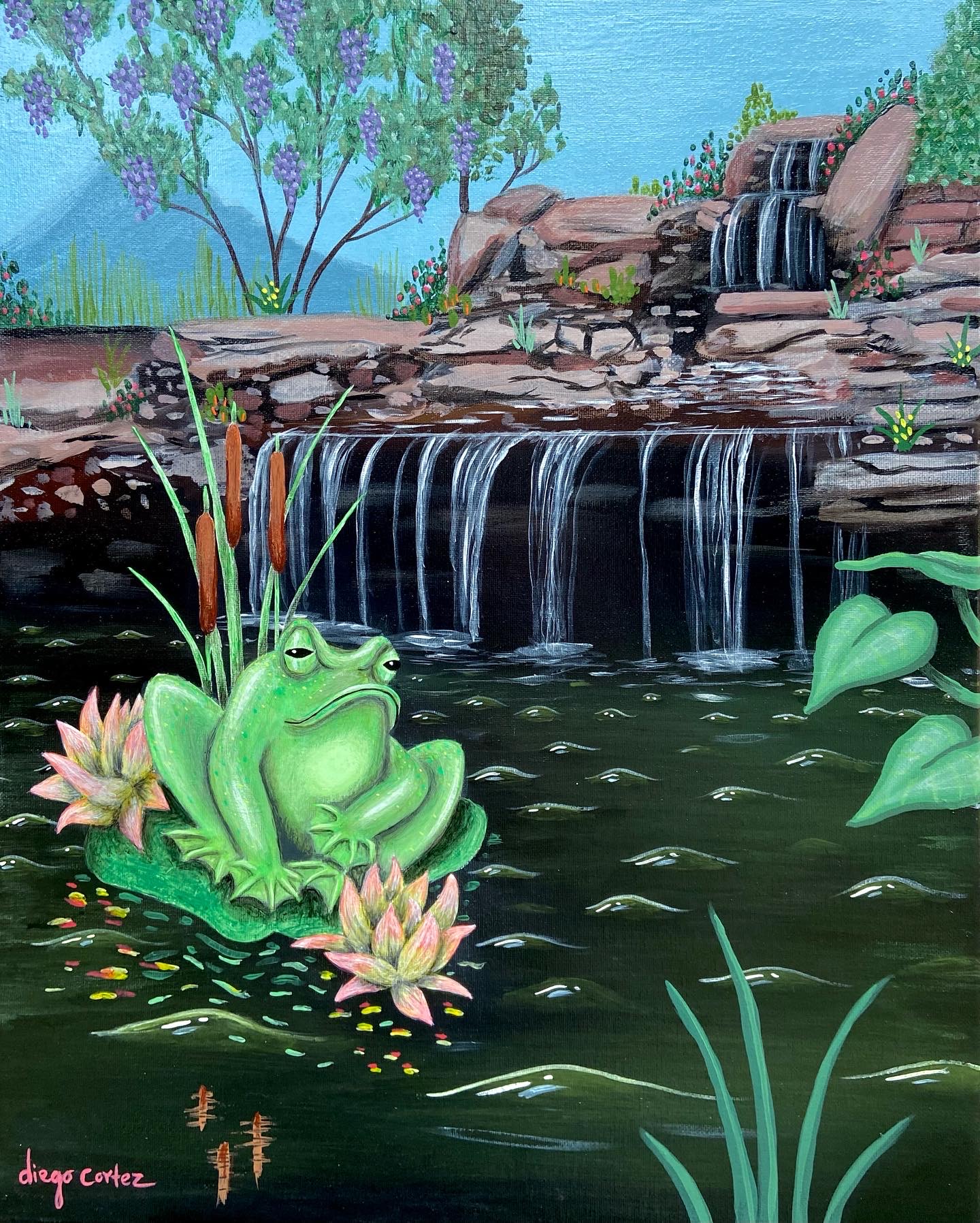 A green frog sitting on a lily pad with pink flowers in a pond, waterfall in background, trees and blue sky.
