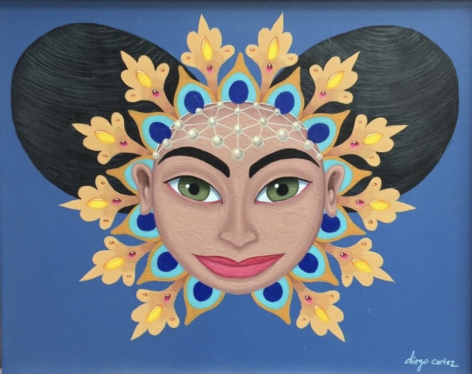Portrait of a woman with large black hair styled in two buns, surrounded by a decorative floral headpiece with yellow, blue, and pink elements, against a blue background.