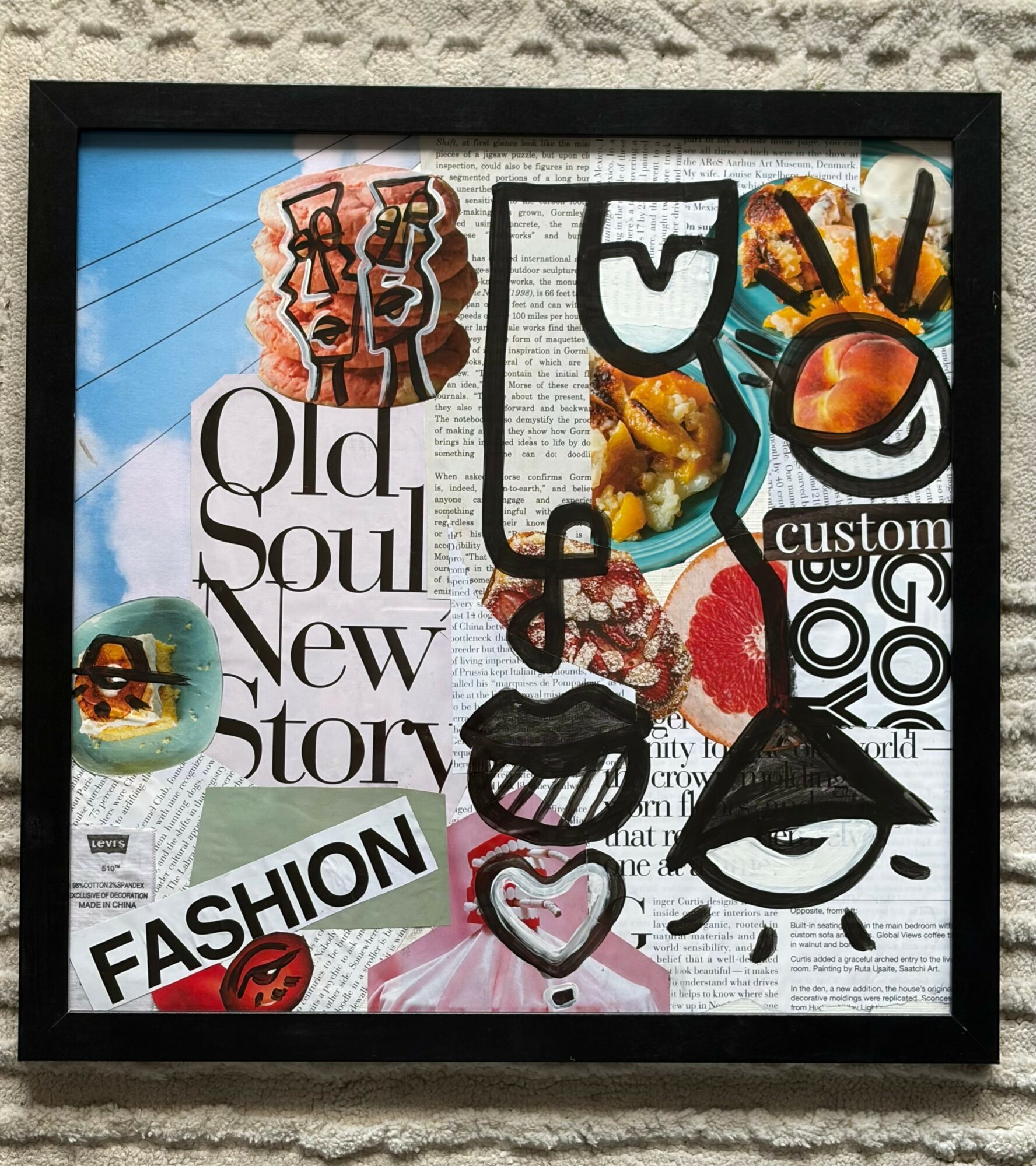 Collage with newspaper clippings, colorful drawings, and fashion-related words, framed in black.