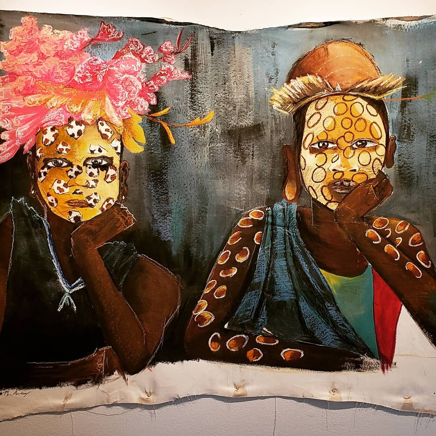 Two abstract figures with patterned faces and arms, one with pink flowers on head, the other with a hat, both resting their chins on their hands.