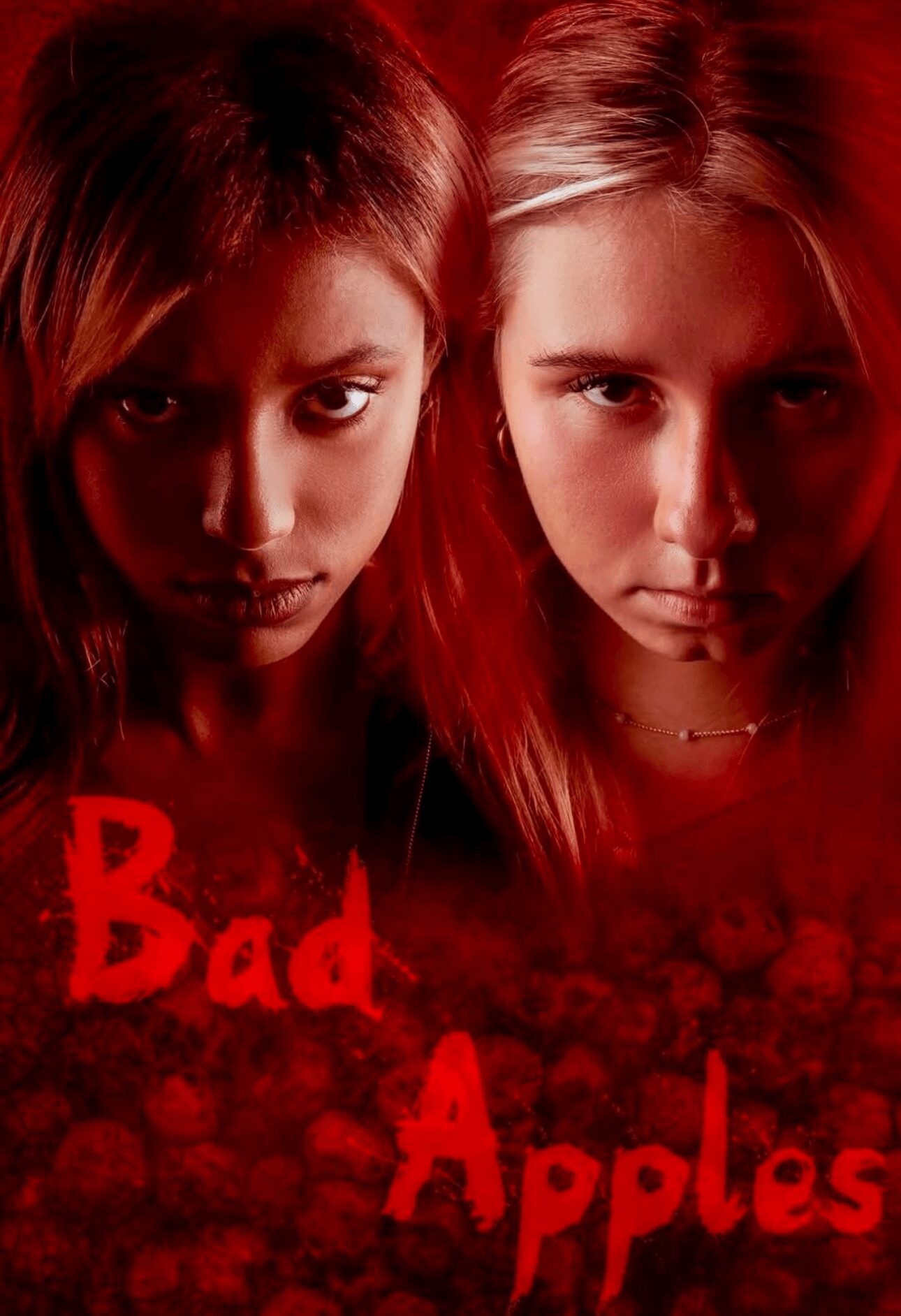 Two young women with serious expressions, red lighting, and the words 'Bad Apples' in red text.