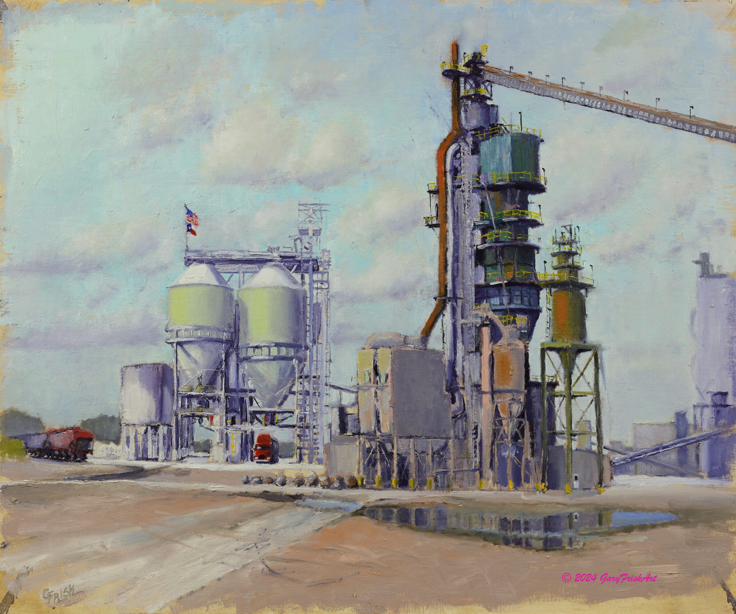Industrial factory with tanks, pipes, and a crane, under a cloudy sky, with vehicles nearby.