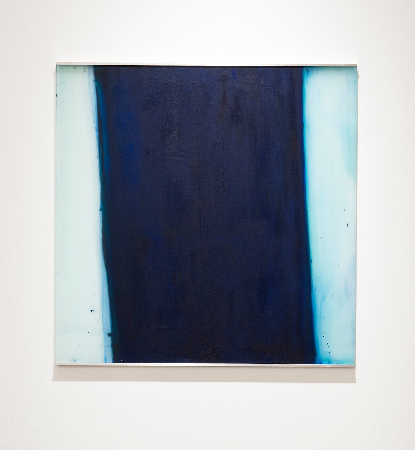 Abstract painting with a large dark blue central area and light blue borders on a white background.
