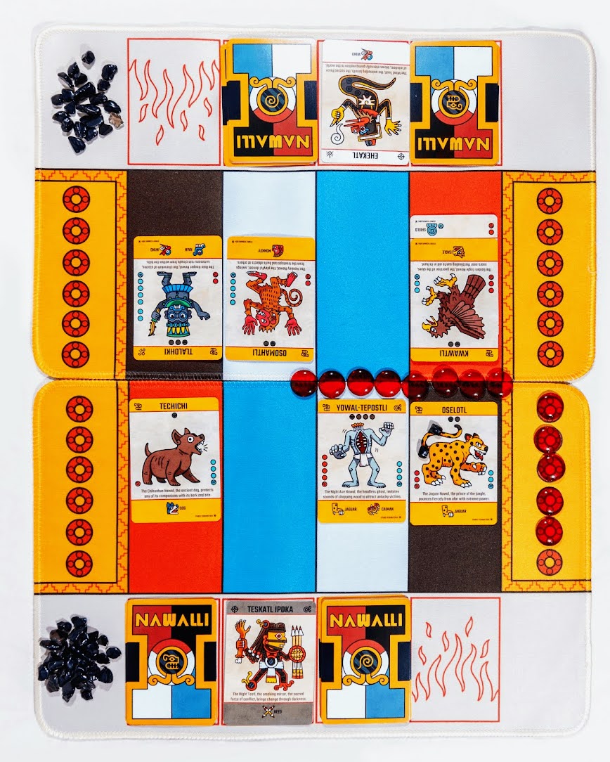 Mahjong game with tiles, some showing animals, flames, and symbols, arranged on a white surface with black game pieces.