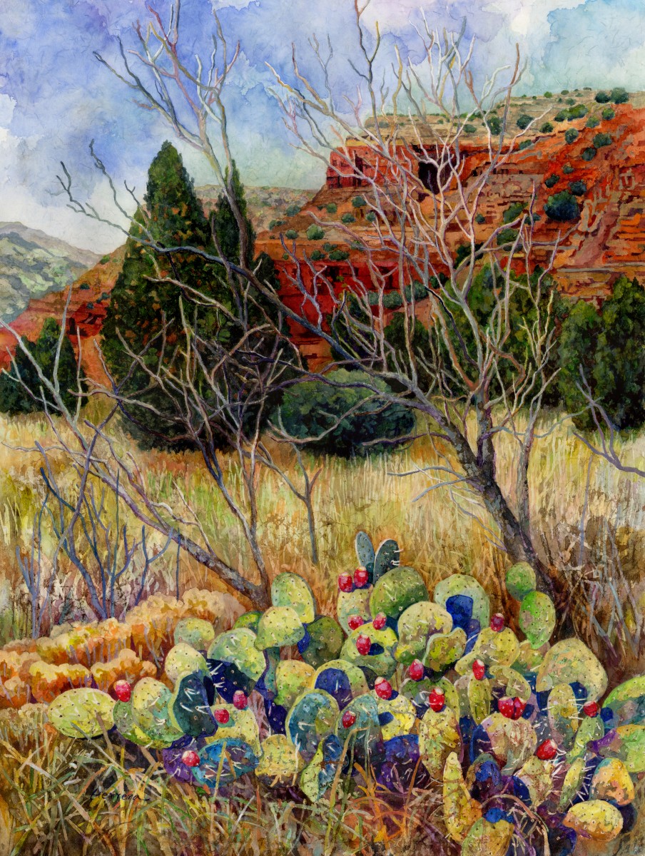 Landscape with trees, bushes, and cacti in front of a hillside with buildings, under a cloudy sky.