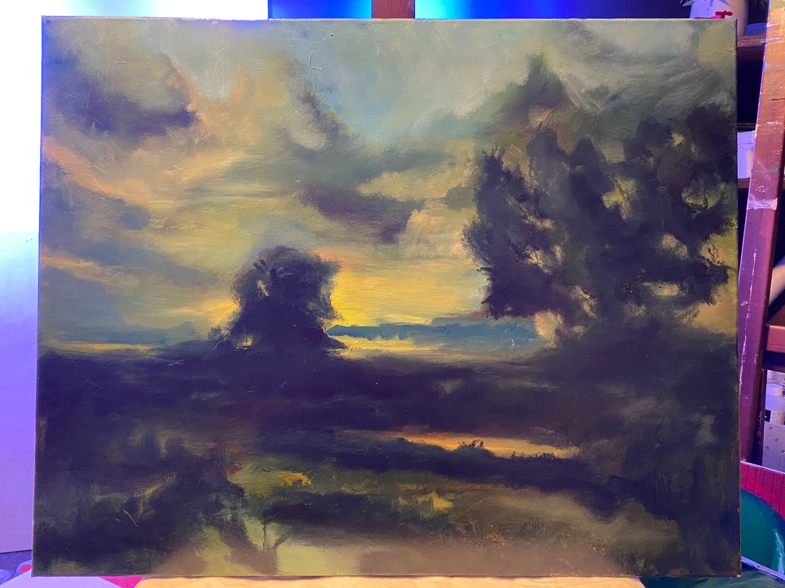Landscape painting of a cloudy sky with dark and light clouds, and a horizon with trees and land, in a moody atmosphere.