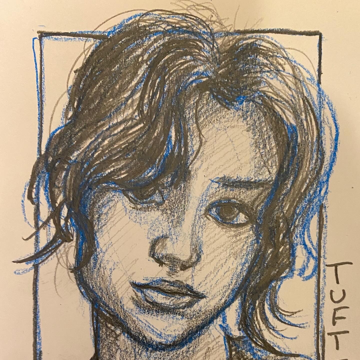 Sketch of a woman's face with wavy hair, detailed eyes, nose, and lips, in a rectangular frame, with the word 'TUFT' on the side.
