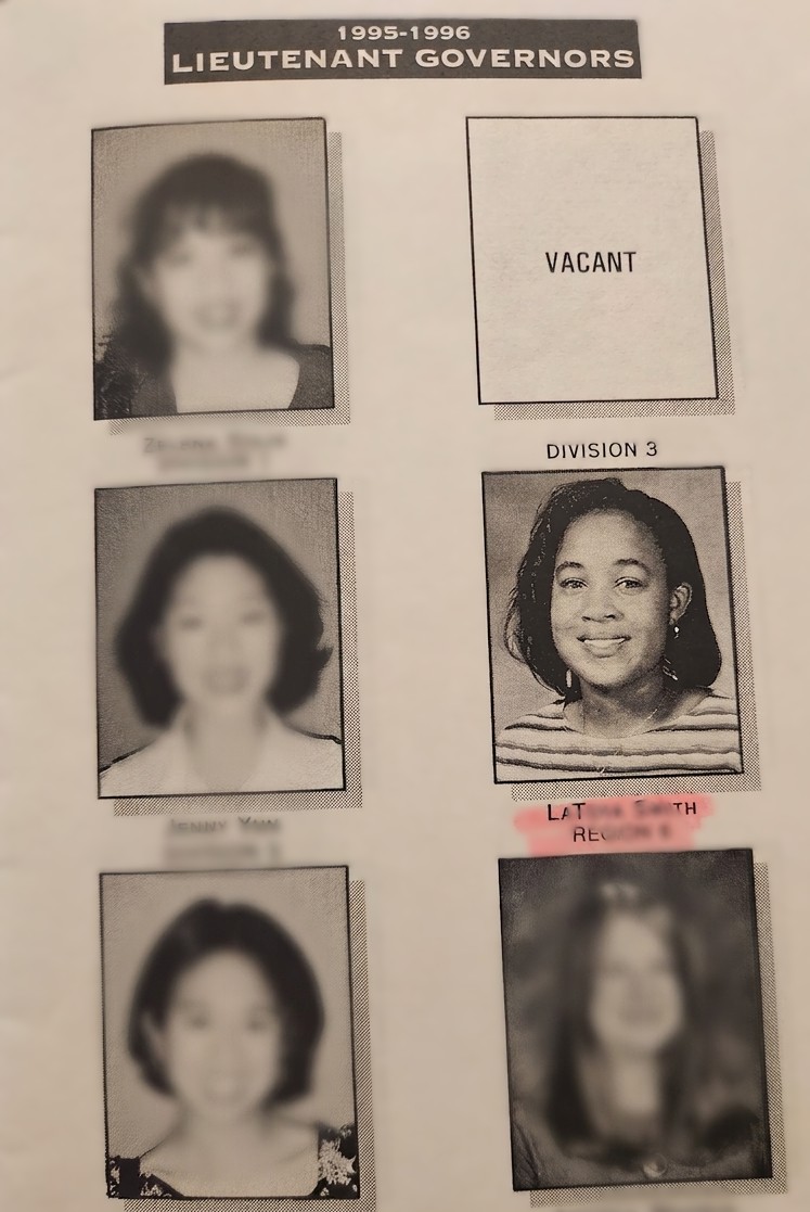 Page with photos of lieutenant governors, one vacant, and a division 3 photo of a woman smiling, with red text overlay.