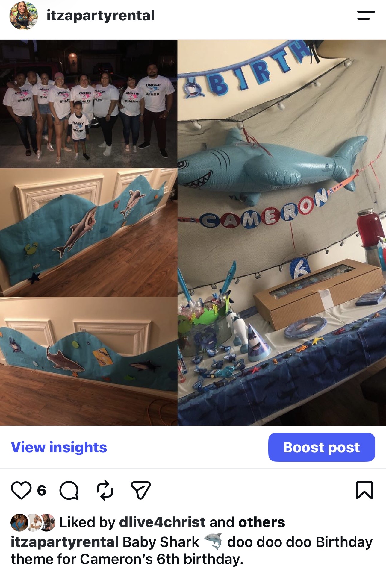 Group of children celebrating birthday with decorations and a large shark-shaped cake, party supplies, and a banner reading 'HAPPY BIRTHDAY'.