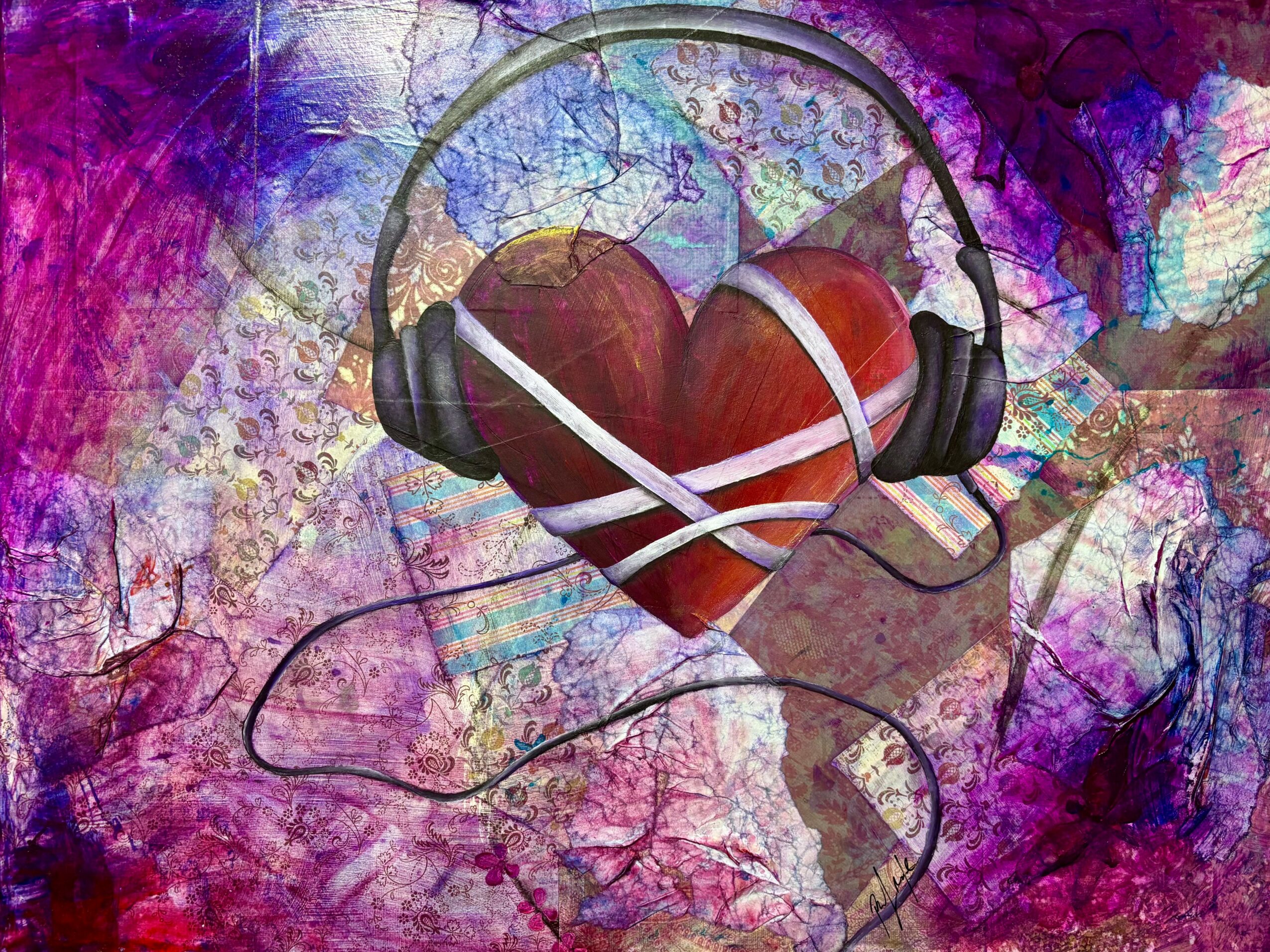Heart with headphones against colorful abstract background.