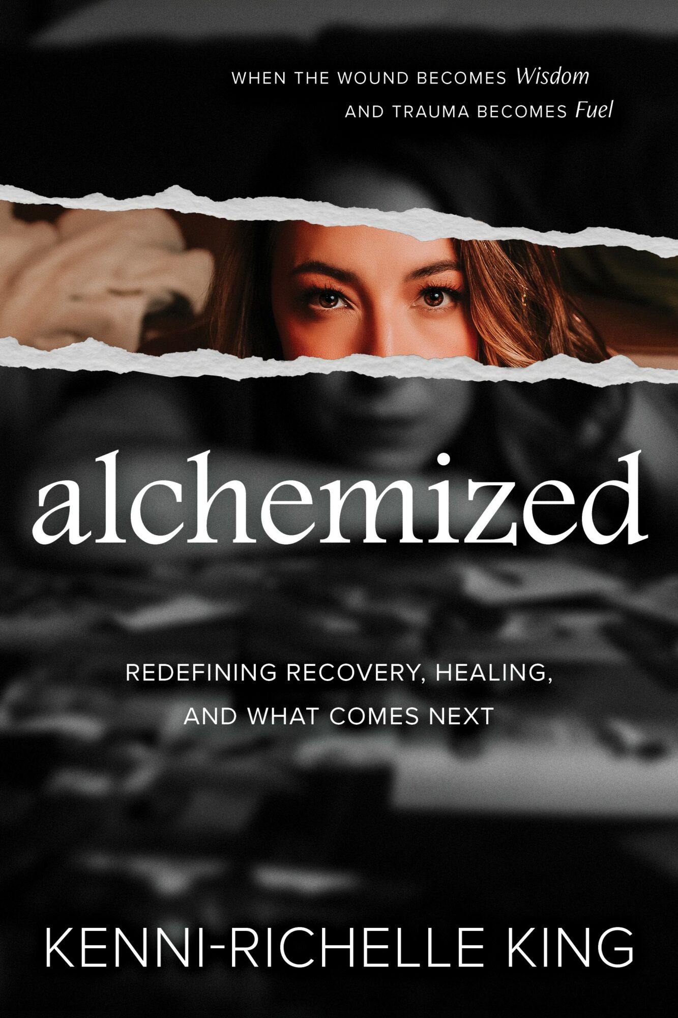 Book cover with torn paper revealing a woman's eyes, title 'alchemized', and subtitle about recovery and healing.
