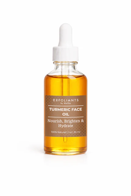 Dropper bottle of turmeric face oil with a white cap and amber liquid, label reads exfoliants turmeric face oil.