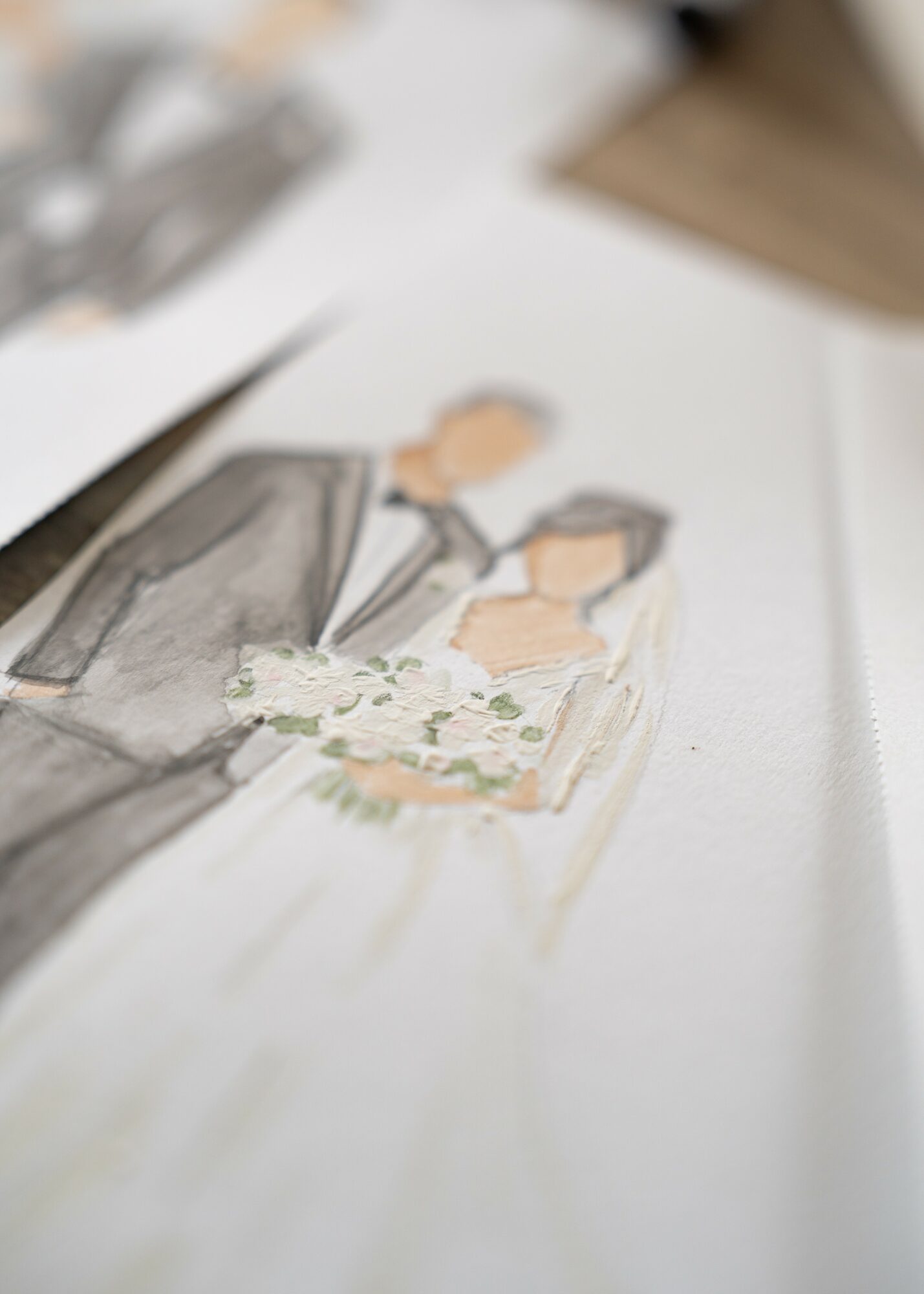 A wedding illustration of a bride and groom holding a bouquet, with the bride in a white dress and veil.